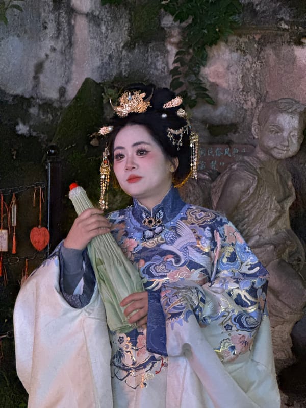 Traditional costume photography session documented in Chongqing's Yuzhong District