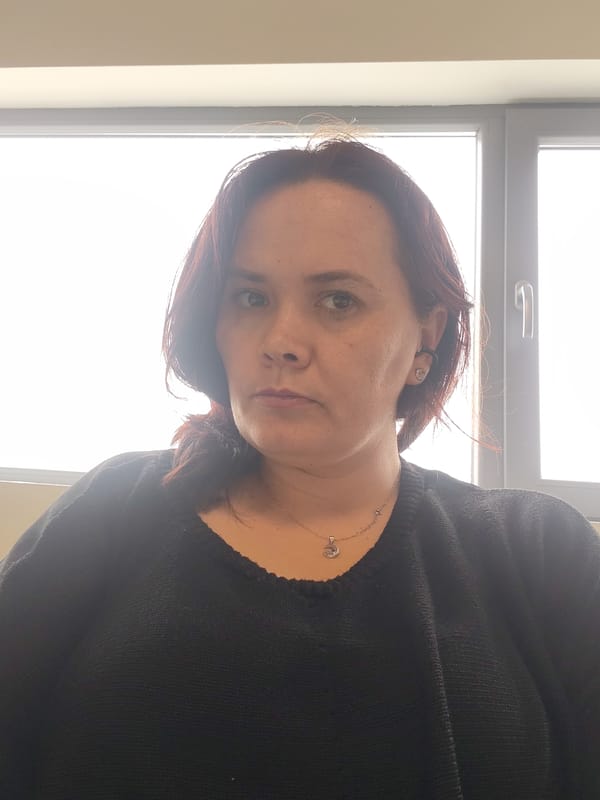 Woman photographed indoors in Sofia, Bulgaria