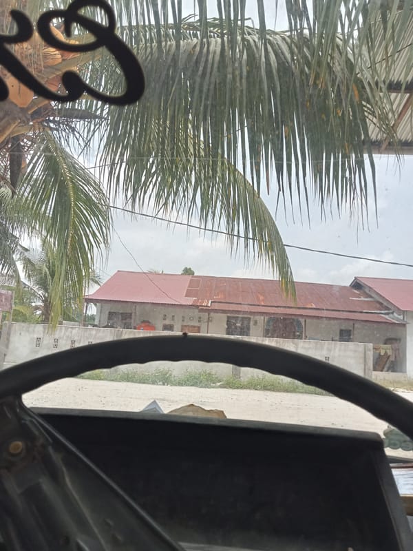 Street-level and rooftop views from Melayu Besar Kota