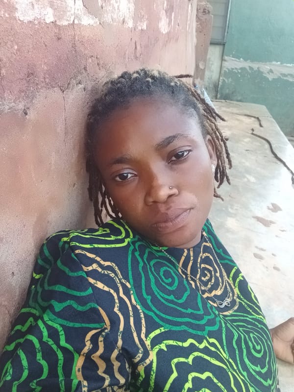 Unidentified person with dreadlocks captured in close-up portrait