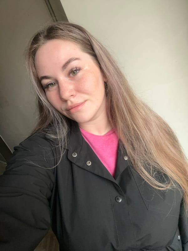 Woman documents morning routine with cat in Chaikovsky, Russia