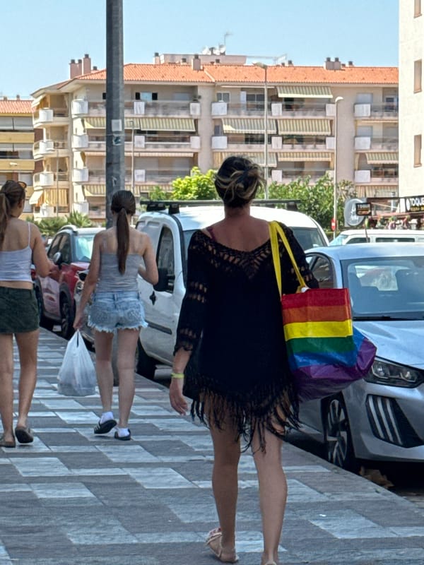 Blanes market scene with local police and souvenir stalls