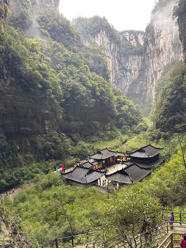 Tourists explore dramatic gorges and caves in Chongqing region