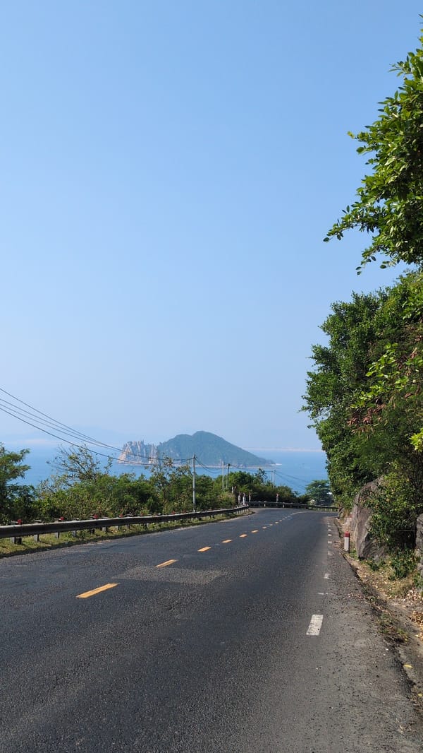 Coastal road captured in Đại Lãnh, Vietnam under clear skies