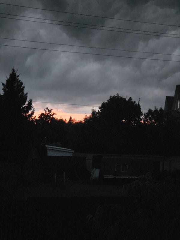 Storm clouds gather over a residential neighborhood in Frolovo, Russia