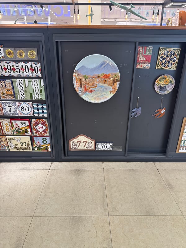Ceramic art and decorative plates on display in Yerevan shop