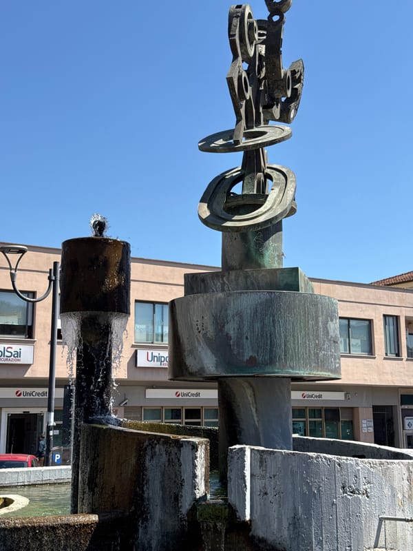 Morning life unfolds in Aprilia's public squares and streets