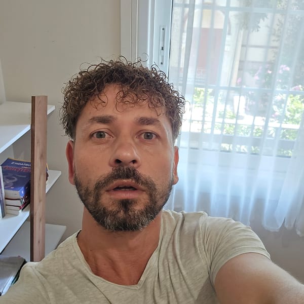 Surprised expression caught in a low-angle Athens selfie