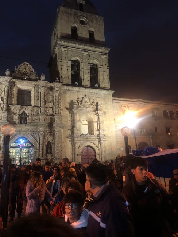 Evening crowds gather at La Paz religious landmarks