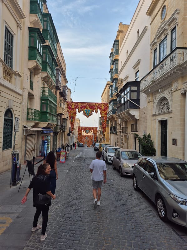 Cobblestone streets and ornate architecture in Valletta, Malta