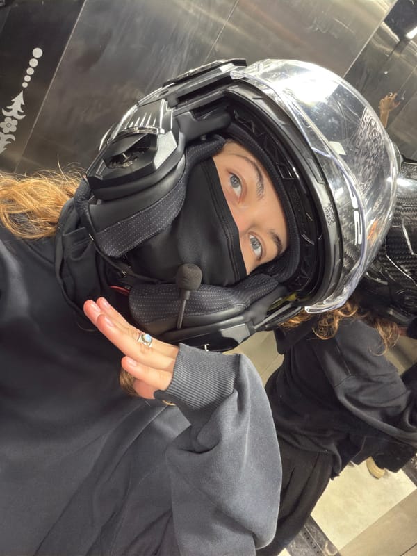 Helmeted motorcyclist photographed in Đà Nẵng, Vietnam