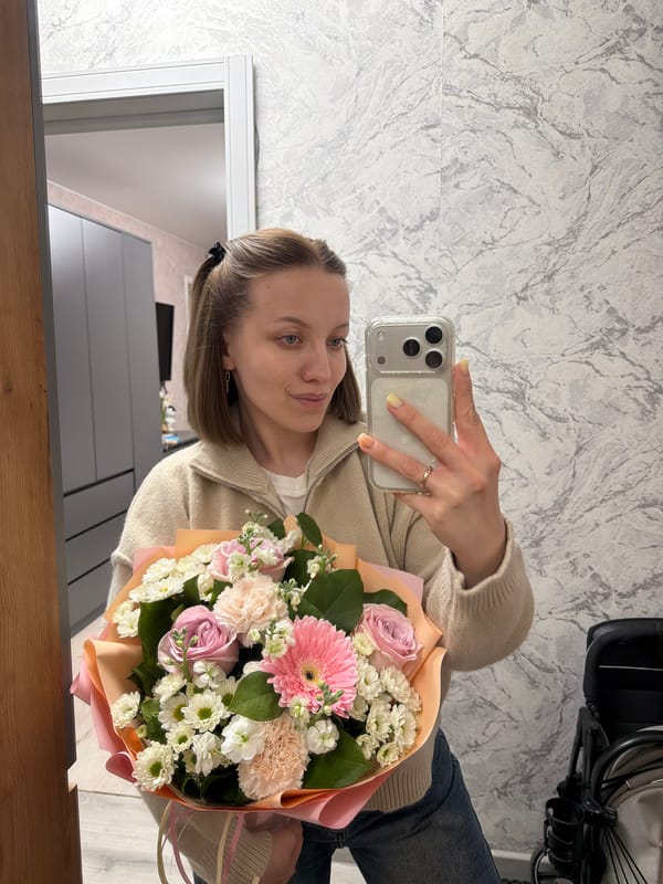 Woman documented with flowers, walking at night in Reshetnikovo