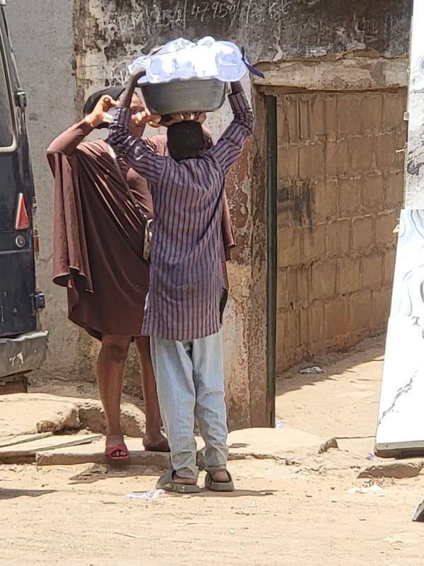 Daily street life documented in Maiburiji, Nigeria morning hours