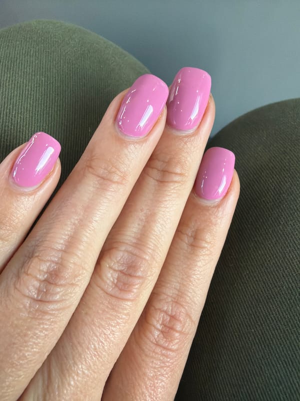 London witness captures studio shot of aged hand with pink manicure