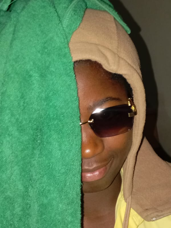 Person photographed multiple times indoors in Jos, Nigeria