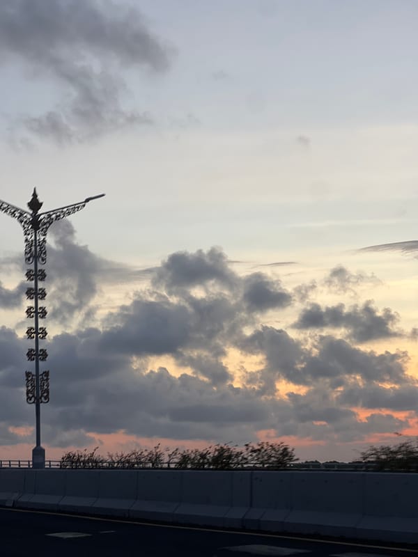 Ornate streetlamp at dusk in Kuta, Bali