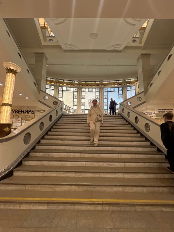 Shopper climbs stairs at Minsk's GUM department store
