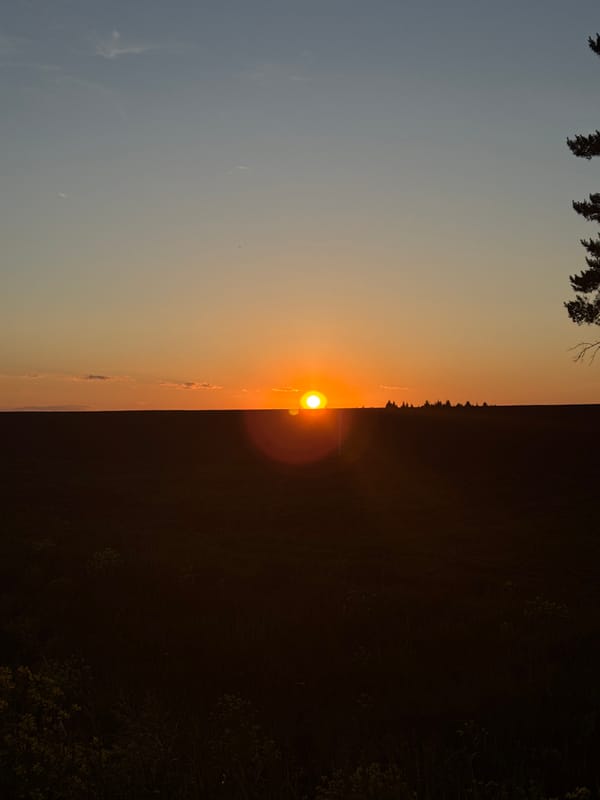 Sunset photographed over rural Perevoznoe, Russia landscape