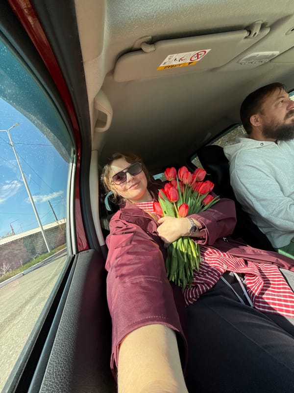 Car interior photographed with two people in Aksay, Kazakhstan