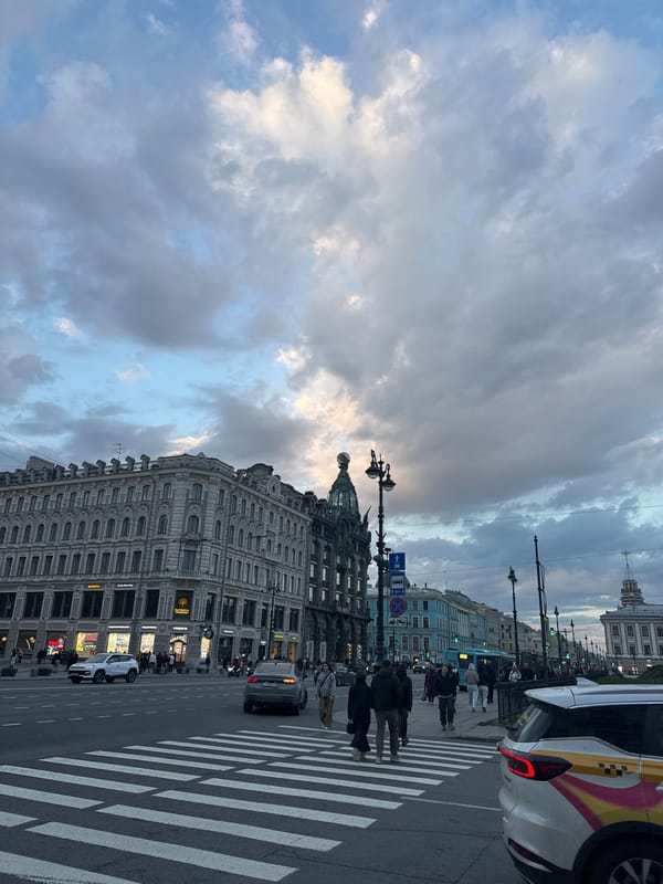 Afternoon street activity documented near Kazan Cathedral, Saint Petersburg