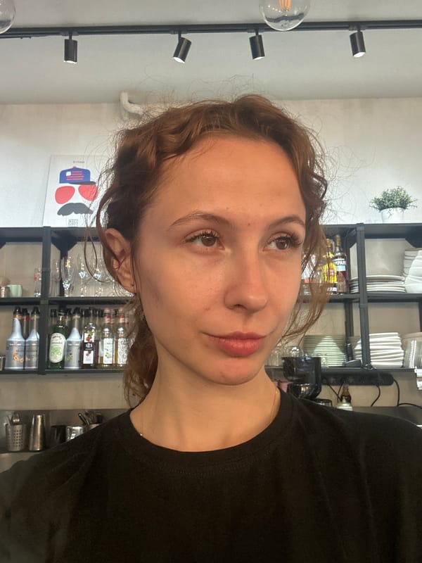 Woman documents dining experience with selfies in Novi Sad