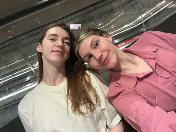 Two women take selfie at Changi Airport Terminal 1