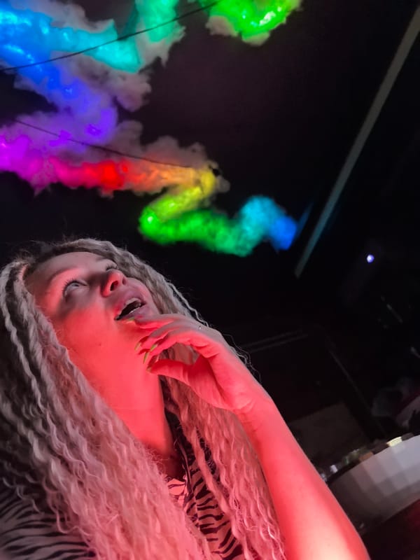 Colorful cloud ceiling decorations illuminate indoor space in Noviy