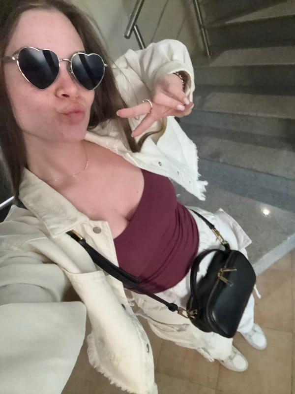 Woman takes peace sign selfie in Plovdiv, Bulgaria