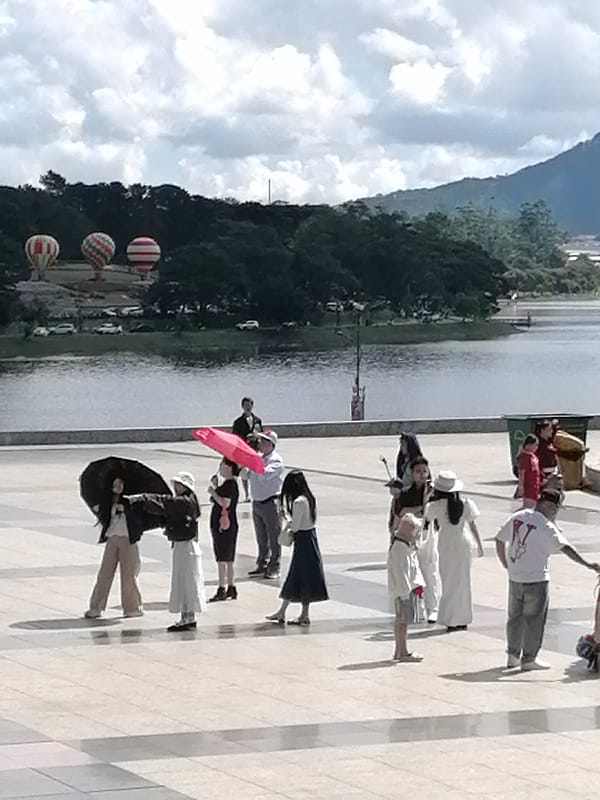 Tourist activities documented around Da Lat landmarks during morning hours