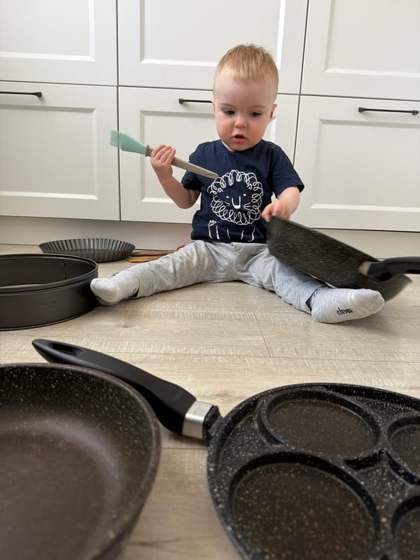 Mother and toddler share quiet morning moment in Votkinsk kitchen