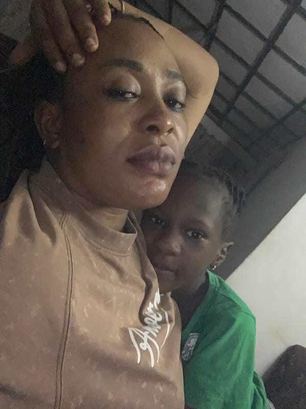 Woman and child photographed in intimate indoor portraits, Nigeria
