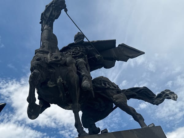 Exploring Veliko Tarnovo's iconic warrior monument and hillside cityscape