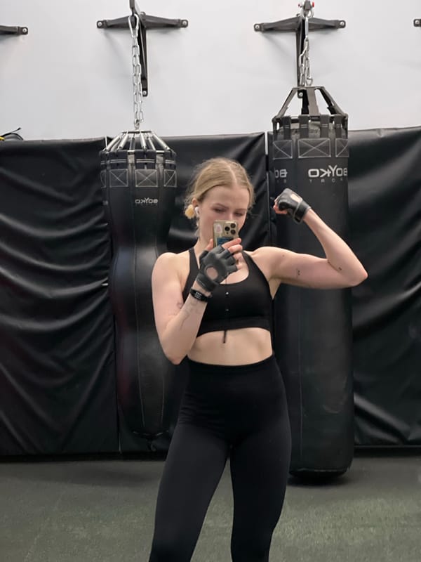 Woman completes boxing and cardio workout session in Khimki gym