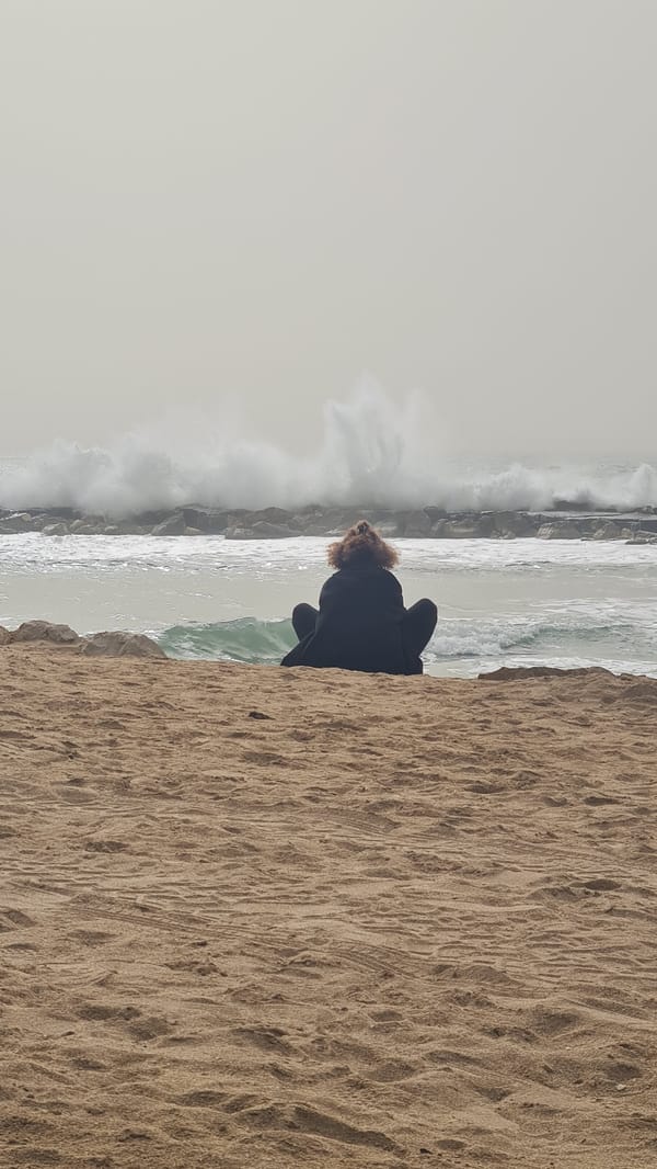Woman photographed at Nahariyya beach in multiple casual poses