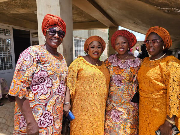 Formal gathering in Kabong, Nigeria, traditional dress throughout