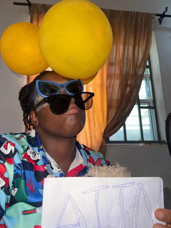Friends gather for indoor celebration with balloons and costumes