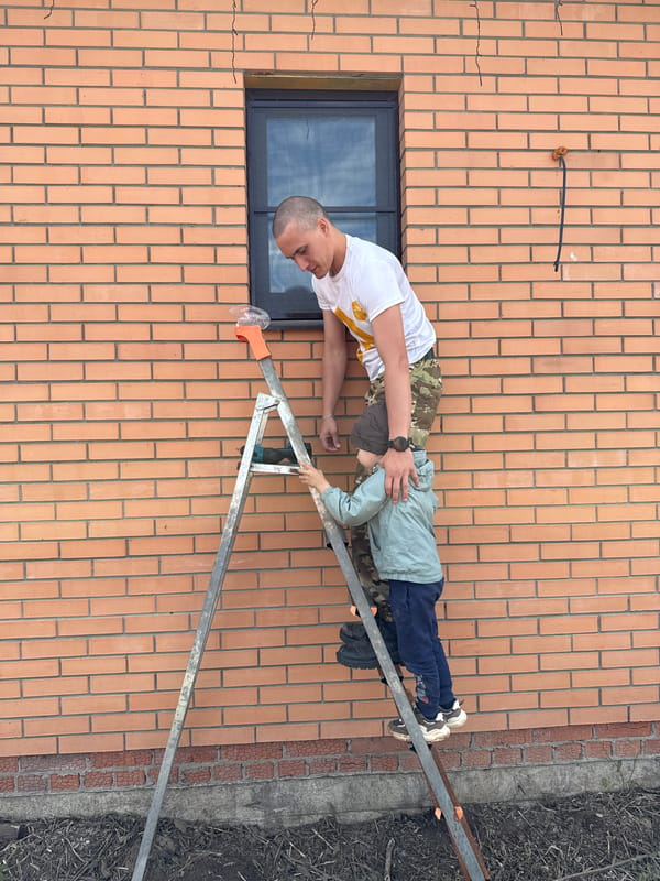 Father and son repair work captured in Chaikovsky, Russia