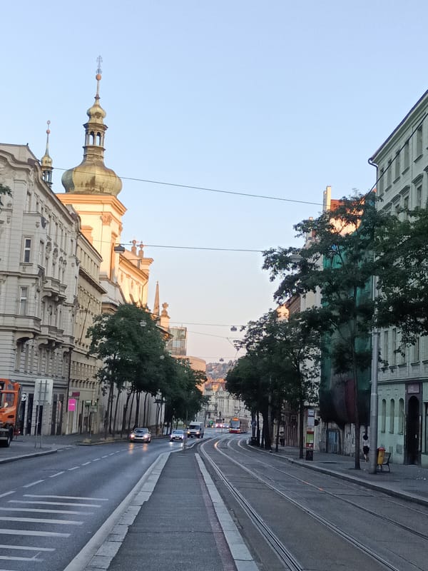 Early morning tram ride through Prague's quiet city streets