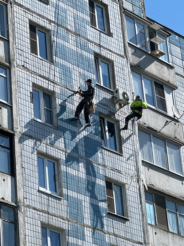 Building maintenance work and daily life in Mytishchi, Russia