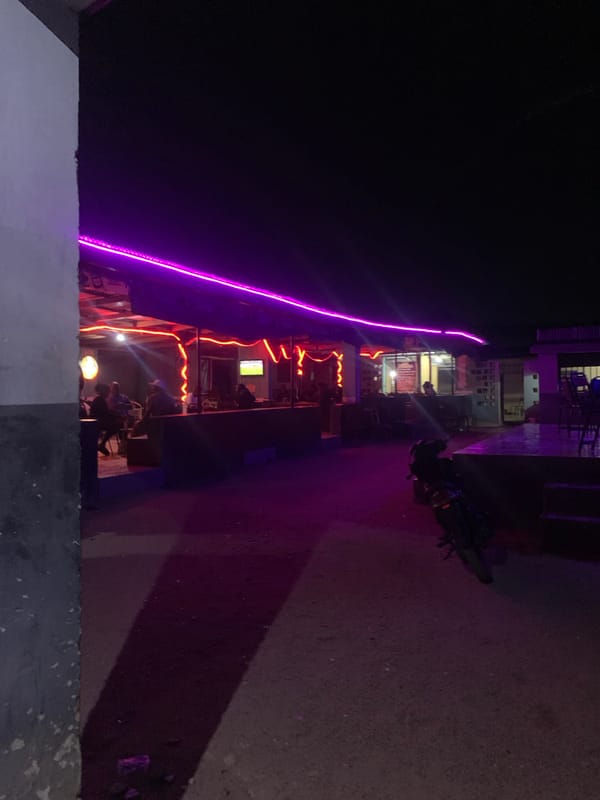 Nigerian scenes: cash handling, crypto monitoring, dining, football viewing
