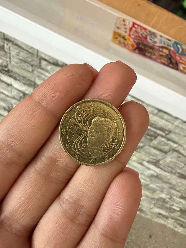 Close-up of a Croatian gold coin with classic design details