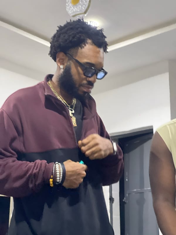 Indoor hangout in Abuja with balloons and casual vibes