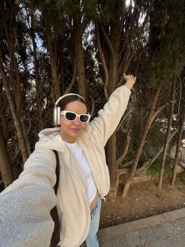 Woman takes selfie in Barcelona urban setting