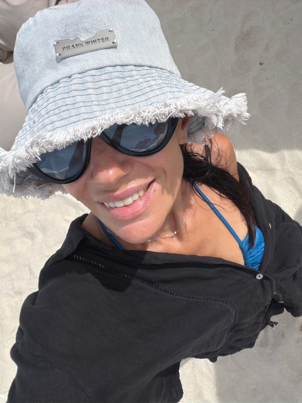 Beach selfies at Baan Chaweng in a statement bucket hat