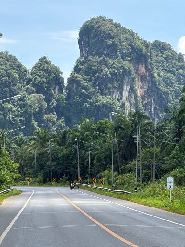 Motorcycles on a karst mountain road in southern Thailand