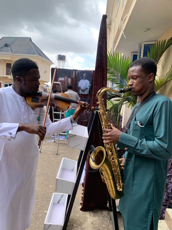 Live music and a decorated hall mark a celebration in Gura Top