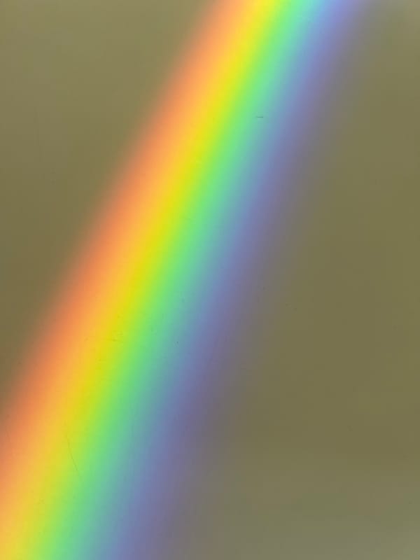 Rainbow spectrum appears on surface in Spanish town