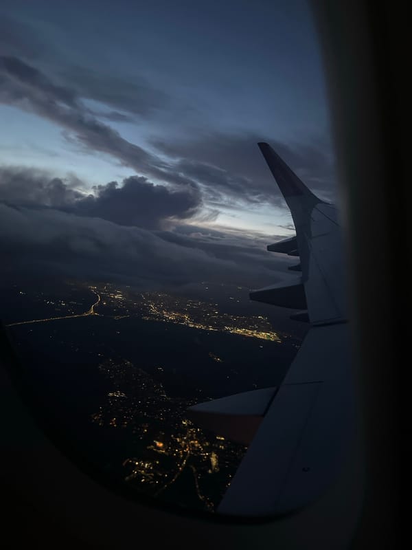 Airplane passenger captures aerial view over St Albans evening lights