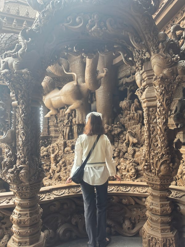 Tourist explores Pattaya's Sanctuary of Truth and attractions