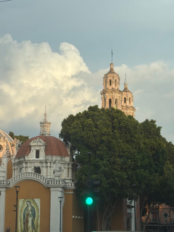 Historic domed buildings with religious imagery documented in Puebla